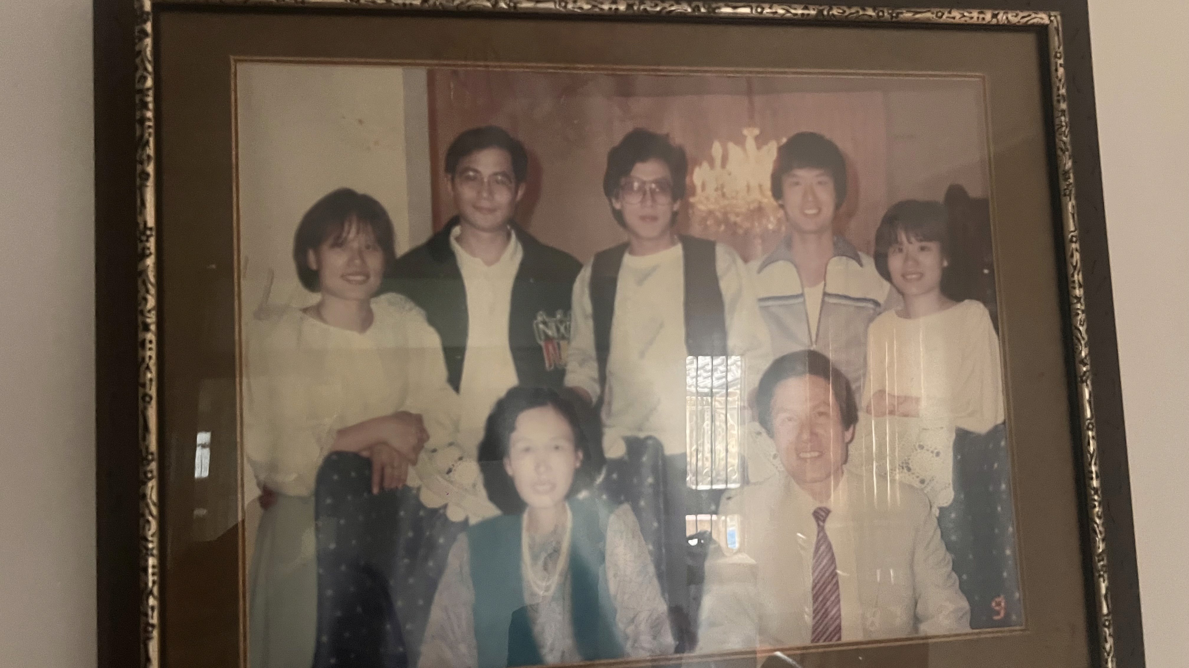 A framed family photograph